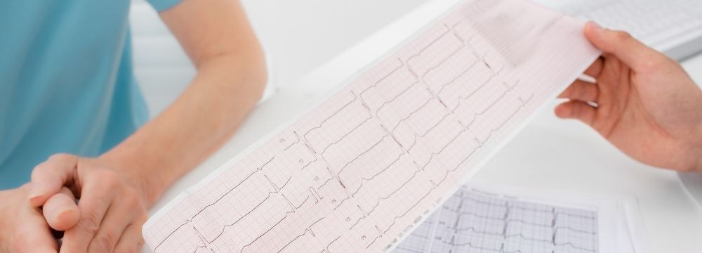 Patient and electrophysiologist review diagnostic cardiology test results for silent Afib