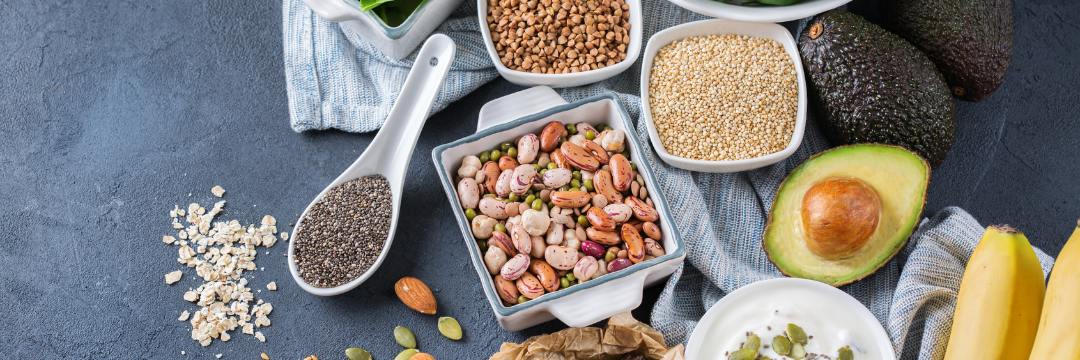 Variety of foods containing magnesium lying on table with tablecloth